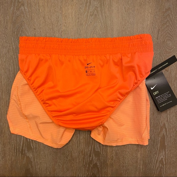 NIKE Women’s Standard Dri-FIT Mesh Running Shorts - Picture 10 of 13